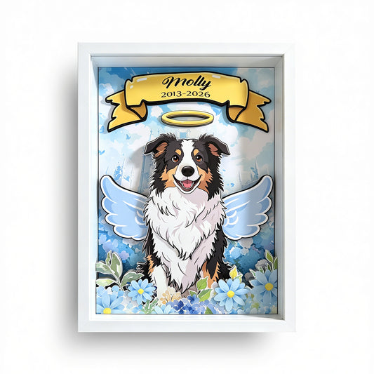 Handcrafted 3D layered paper-cut memorial shadow box featuring a custom hand-drawn angel dog with halo and wings in a white frame